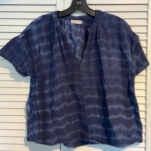 Blue loose shirt with low v neck